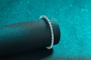 Close-up of S925 sterling silver tennis bracelet with brilliant round-cut moissanite stones