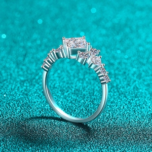Elegant S925 sterling silver ring featuring princess cut moissanite and pave stones
