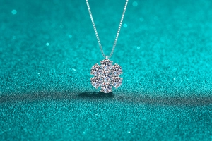 Detailed view of sunflower moissanite pendant with elegant silver box chain and high-gloss finish