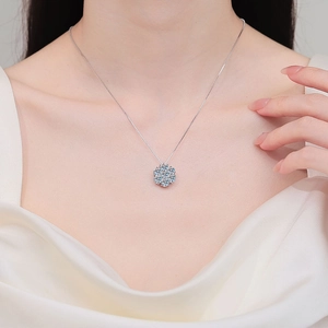 Elegant S925 silver sunflower necklace with light blue moissanite stones on a box chain
