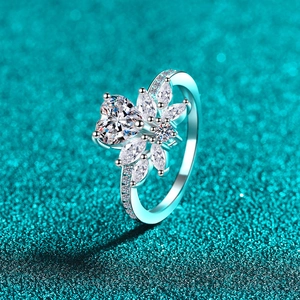 Luxurious S925 silver ring featuring a heart-shaped moissanite in a floral cluster design