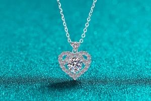 Close-up of S925 silver heart pendant with brilliant round-cut moissanite stone