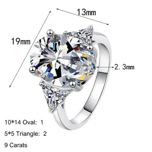 Elegant 9 carat oval moissanite ring with triangle side stones in polished silver