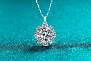 Macro shot of S925 sterling silver sunflower necklace with moissanite and box chain