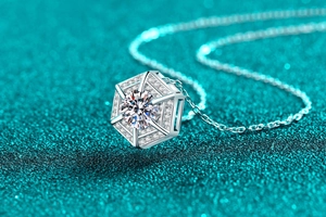 Macro shot of hexagonal moissanite pendant featuring S925 sterling silver pave diamonds