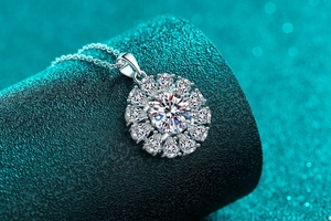 Macro shot of S925 sterling silver sunflower pendant necklace with moissanite stones