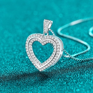 Elegant S925 sterling silver double heart pendant necklace with shimmering moissanite stones