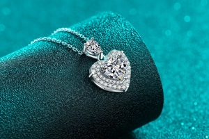 Close-up of S925 silver heart moissanite necklace with exquisite double halo setting