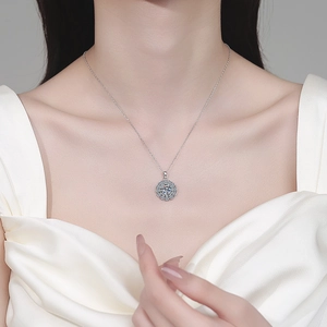 Elegant S925 sterling silver moissanite sunflower pendant necklace on female model
