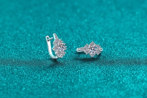 Detailed view of S925 sterling silver moissanite stud earrings with flower cluster design