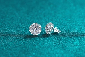 Macro view of S925 sterling silver moissanite sunflower stud earrings with butterfly back