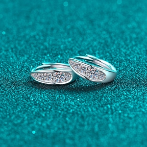 Elegant 925 sterling silver huggie earrings featuring five sparkling moissanite stones