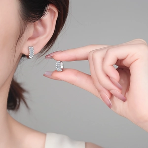 Classic S925 sterling silver moissanite hoop earrings worn for a stylish daily look
