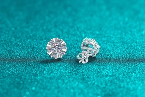 Macro view of S925 sterling silver sunflower moissanite stud earrings with brilliant stones