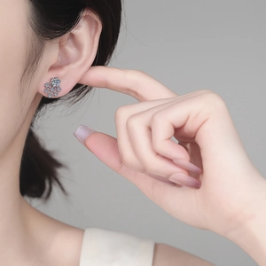 Sparkling S925 sterling silver snowflake earrings with round moissanite for women