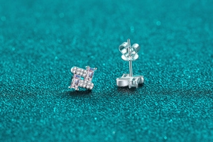 Close-up of S925 silver earrings with pink rectangular moissanite and micro-pave crystals