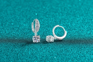 Macro shot of S925 sterling silver hoop earrings with brilliant-cut moissanite stones