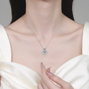 Elegant S925 sterling silver heart moissanite necklace worn on female neck model