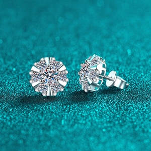 Sparkling S925 sterling silver moissanite sunflower stud earrings on shimmer background