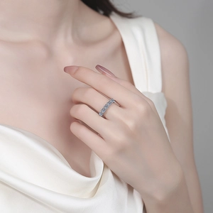 Elegant S925 sterling silver moissanite row ring showcased on a female hand