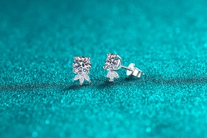 Macro shot of S925 sterling silver moissanite stud earrings with marquise petal design