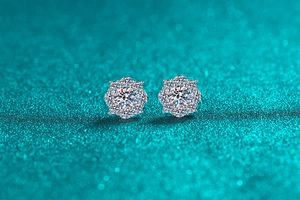 Macro shot of S925 sterling silver flower earrings with sparkling moissanite cluster