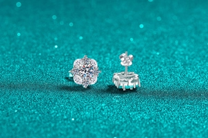 Macro shot of S925 sterling silver flower earrings with sparkling moissanite stones