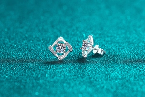 Detailed view of square geometric S925 silver stud earrings with moissanite stones