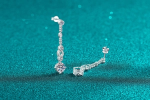 Macro shot of 925 sterling silver tassel earrings with moissanite drop stones