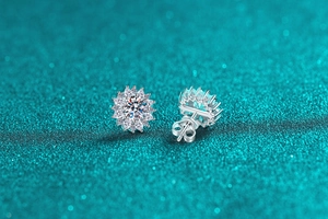 Detailed close-up of S925 silver sunflower stud earrings with moissanite stones