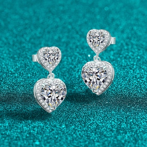 Elegant S925 sterling silver heart-shaped moissanite halo drop earrings on green background