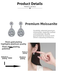 Macro shot of silver plated teardrop moissanite earrings with multi-layer rhodium finish
