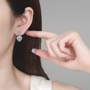 S925 sterling silver moissanite double heart drop earrings on female model