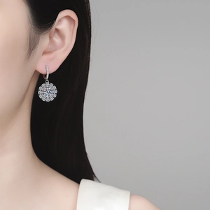 Elegant S925 sterling silver moissanite sunflower stud earrings on model for gift