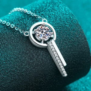 Elegant S925 sterling silver key necklace with moissanite pendant on a cross chain