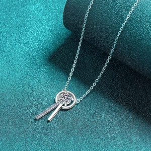 S925 sterling silver moissanite necklace with geometric tassel pendant on green base