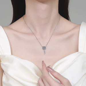 S925 sterling silver moissanite necklace featuring a geometric ring and tassel pendant