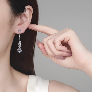 Elegant S925 sterling silver drop earrings with marquise and round moissanite tassels