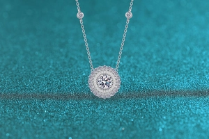 Macro shot of S925 sterling silver sunflower necklace with brilliant moissanite pendant