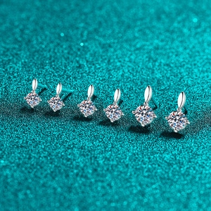 Set of S925 sterling silver moissanite stud earrings in six sizes on teal background