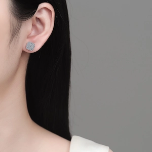 Elegant S925 sterling silver square moissanite stud earrings worn by a model