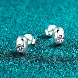 Elegant pair of S925 sterling silver oval stud earrings with sparkling moissanite stones