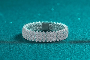 Macro detail of wide multi-row S925 silver bracelet with sparkling moissanite stones