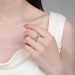 Luxurious S925 sterling silver ring with pavé moissanite stones on a silver band