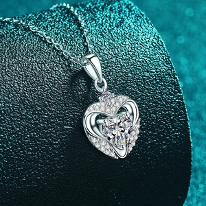 Sparkling S925 silver heart necklace with moissanite pendant on a professional display