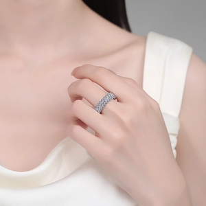 Luxurious S925 sterling silver ring with blue and white moissanite stones on model
