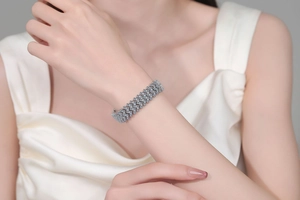 Close-up of luxury S925 sterling silver multi-row moissanite bracelet on model