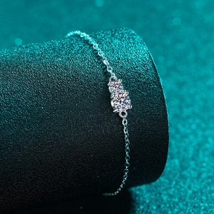Elegant S925 sterling silver moissanite bracelet with two round stones on cross chain