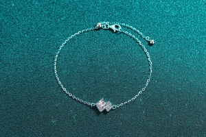 Detailed view of S925 sterling silver bracelet with square moissanite and adjustable chain
