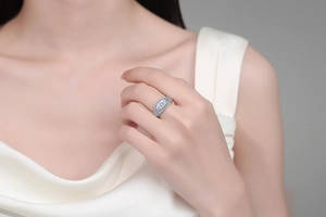 Detailed close-up of a marquise-cut moissanite devil's eye ring on a hand